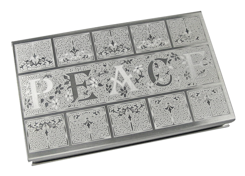 etched PEACE matchbox grip front