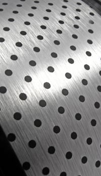 dot pattern on brushed aluminum