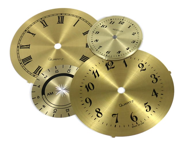 Aluminum clock faces with spun backgrounds